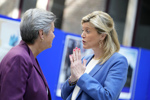 Belgium’s Interior Minister Annelies Verlinden (right) speaks with European Commissioner for Home Affairs Ylva Johansson.