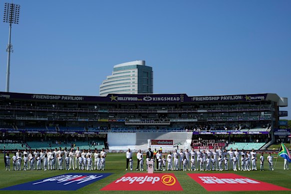 The players line up for the anthems pregame.