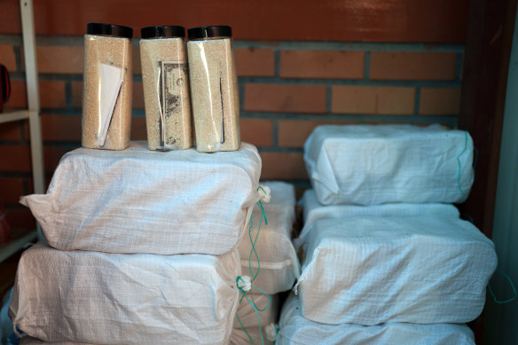Bottles filled with rice and packages, each containing propaganda posters, a US dollar bill and a Bible, which Kim Seongmin’s group plans to send to North Korea.
