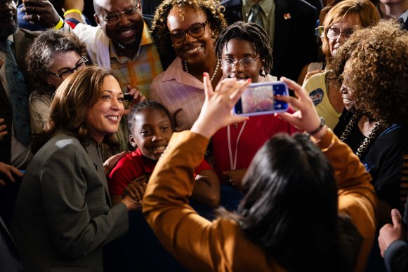 Vice President Kamala Harris greets an attendee at a campaign event in Greensboro, North Carolina.