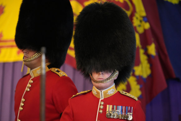 Guardsmen stand vigil over the coffin.