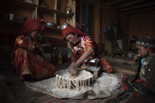 Two Kyrgyz sisters prepare homemade noodles in the settlement of Sultan. The Wakhan corridor is home to the Kyrgyz and Wakhi ethnic minorities.