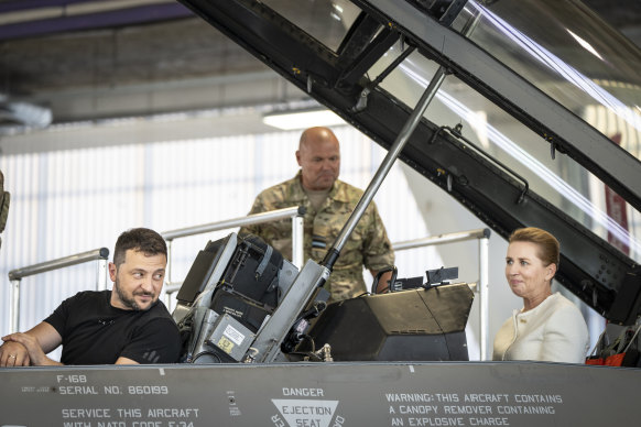 Volodymyr Zelensky with Denmark’s Prime Minister Mette Frederiksen in an F-16 at Skrydstrup Airbase in Vojens.