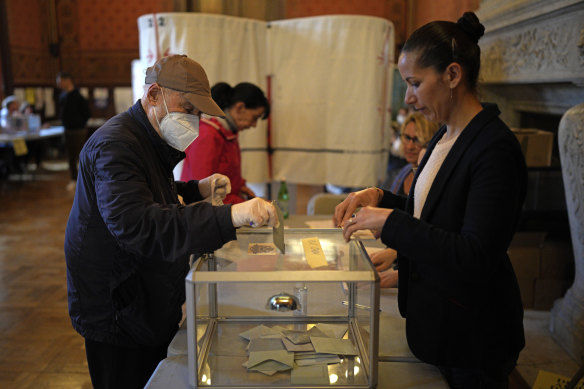 A man casts his vote in Marseille on Sunday. 