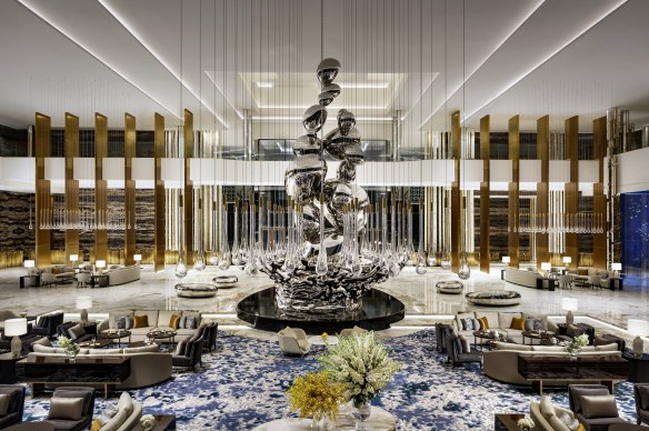 The sculpture Droplets, by GA Group, stands more than 11.5 metres tall in the centre of the sprawling lobby.