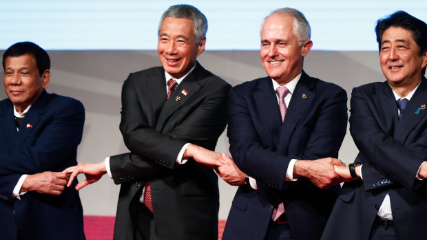 Singapore Prime Minister Lee Hsien Loong, second from left, with Malcolm Turnbull and other leaders at the 2017 East Asia Summit.