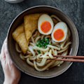Traditional Japanese udon noodles with soft boiled eggs.