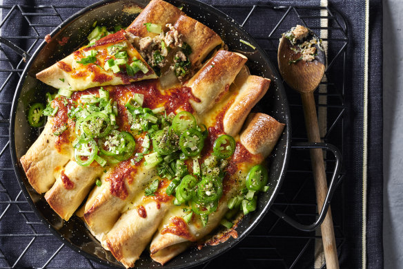 A lime-dressed mix of chopped cucumber and jalapenos brightens these pork-filled enchiladas. 