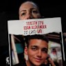 Yael Alexander holds a poster of her son, Edan, who was taken hostage by Hamas militants on October 7, 2023.