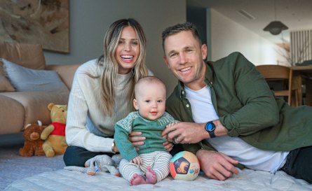 Brit and Joel Selwood with their baby son, Joey.