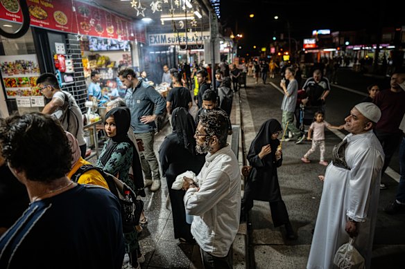 People line up to eat at the Ramadan night markets in Lakemba.