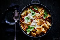 Oven-baked pork ragu and rag pasta with burrata.
