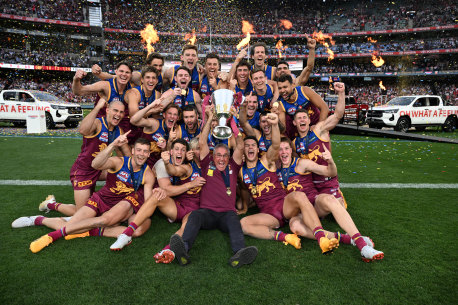 The Brisbane Lions celebrate their premiership win.