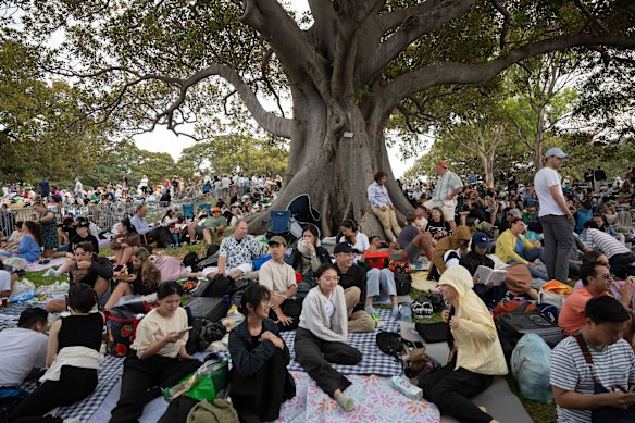 Spectators claim their vantage point at Mrs Macquarie’s Chair 
