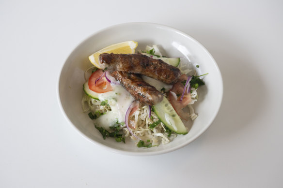 Sheftalia bowl with Cypriot pork sausage with a sweet hint of cinnamon.