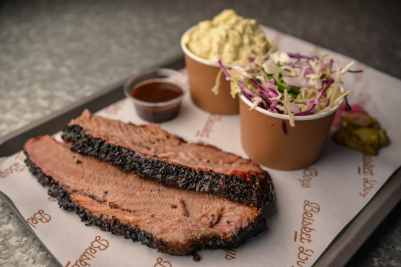 Beef brisket with coleslaw and potato salad. 