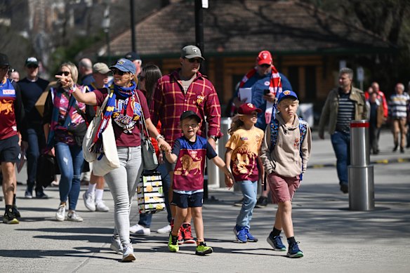 Fans arrive for 2024 AFL Grand Final match between the Sydney Swans and Brisbane Lions at MCG.