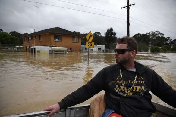 CJ Turner this week carried out search and rescue missions in his runabout boat in Shanes Park, in Sydney’s west, pulling neighbours and stricken farm animals from the floodwaters.