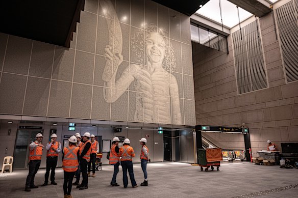 A giant mural of a local Aboriginal dancer on one of the concourse walls is the station’s showstopper.