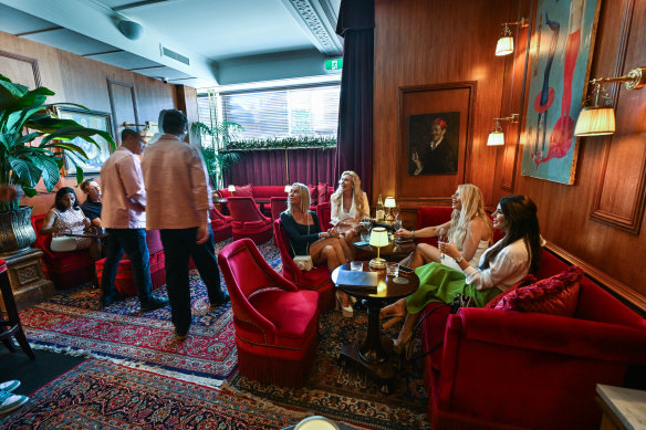Le Splendide’s deep red light shades and velvet chairs evoke a bawdy Belle Époque aesthetic.