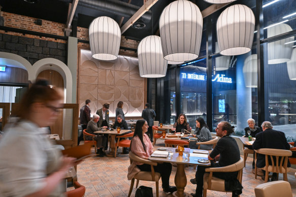 Designer light fittings cast a flattering glow over the former prison canteen.