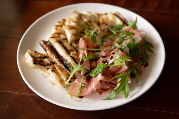 The puffy, grill-marked flatbread is perfect for sharing.