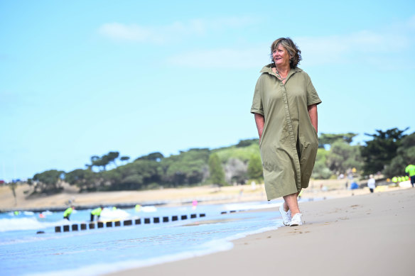 Chris Barr wandering the beach in Torquay. 