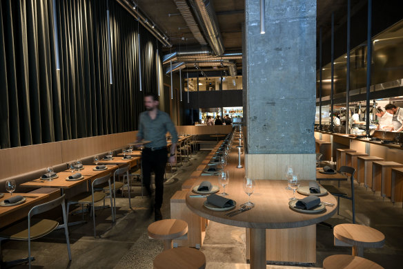 Antara 128’s cavernous dining room has an industrial feel.