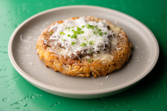 Gamjajeon topped with sweet bulgogi and parmesan.