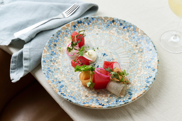 Compressed watermelon, Persian feta, mountain pepper, lemon balm, radish at Me-Gal.