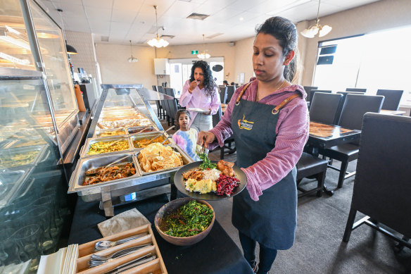 Take a plate and serve yourself from the array of bain marie trays.