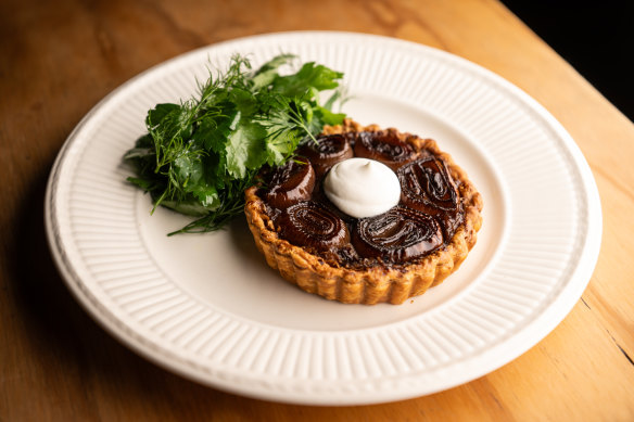 Burnished onion tart, goat.s curd, herbs.