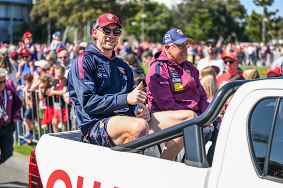 Captain Harris Andrews and coach Chris Fagan of the Lions.