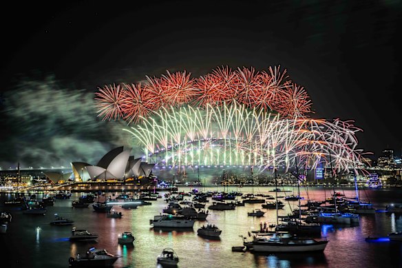The midnight New Year’s Eve fireworks on Sydney Harbour, viewed from Mrs Macquaries Chair.