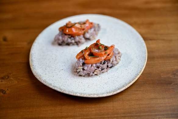 Salted calamari on seasoned rice with Geraldton wax.