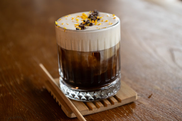 The Magic Brew garnished with orange zest.