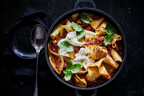 Oven-baked pork ragu and rag pasta with burrata.