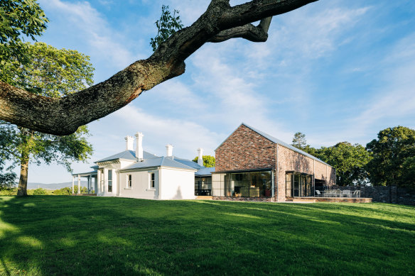 The homestead, just outside Launceston: a glass and steel atrium connects the original 1850s building to its new two-storey extension, which is clad in local brick.
