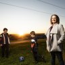 Kate Laney and her sons Lucas  and Nathan, who attend Gledswood Hills primary school. Laney moved to Gregory Hills on the assumption a new school would be built there.