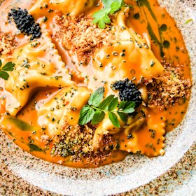 Slipper lobster ravioli with bouillabaisse-inspired bisque.
