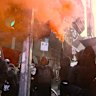 Four arrested as pro-trans protesters clash with police