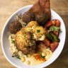 The Khamsa Cafe Jerusalem Bowl with hummus, baba ghanoush, quinoa, fattoush, falafel and cauliflower. 