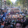 Tens of thousands of workers march through central Melbourne.