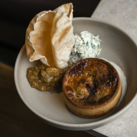 Madras pie with pappadams. 