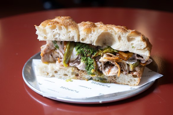 You’ll encounter shards of crackling with every other bite on this porchetta sandwich.