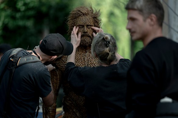Finishing touches are applied to Alexander Skarsgard’s elaborate costume on the set of Wicker.