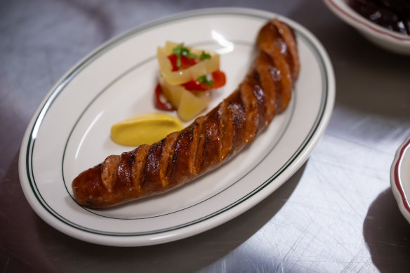 LP’s pork and paprika sausage with condiments.