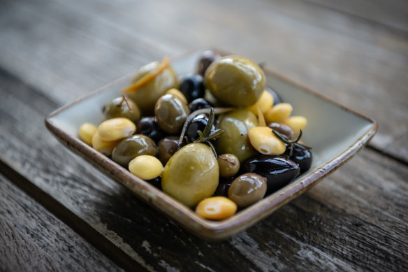 Olives marinated with rosemary and lemon and orange zest.