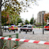 Emergency vehicles sit near a park after a shooting in Trappes, outside Paris, Friday, Oct. 23, 2026. (AP Photo/Emma Da Silva)
