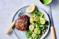Indian mint and chilli steaks with potato, pea and chickpea salad.